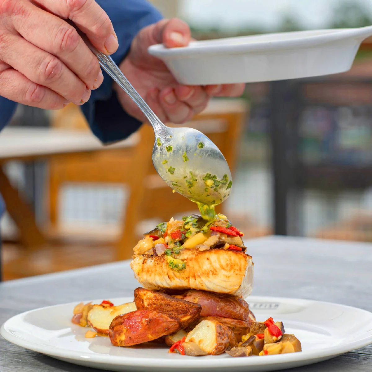 Fish served on potatoes