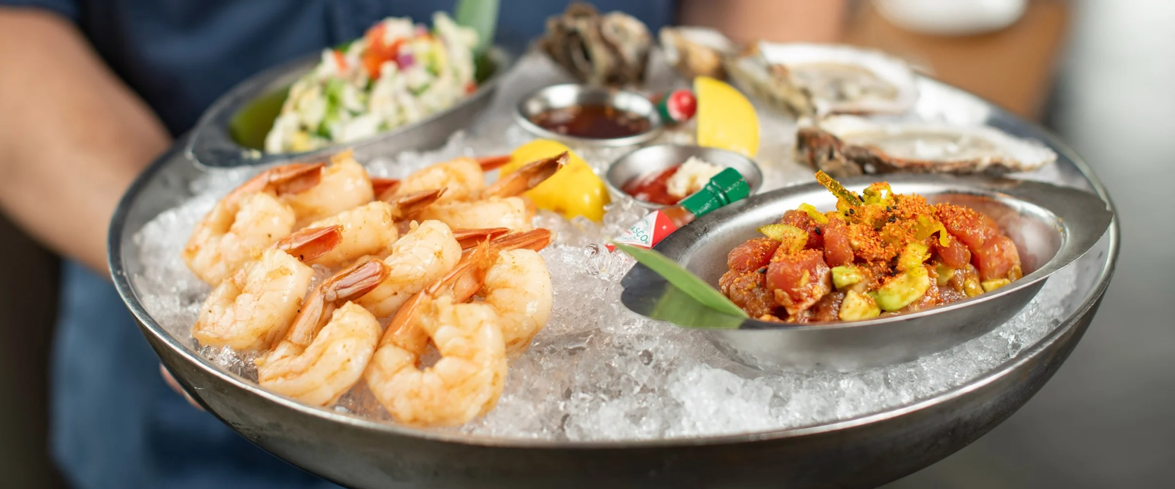 platter of seafood appetizers on ice - desktop version