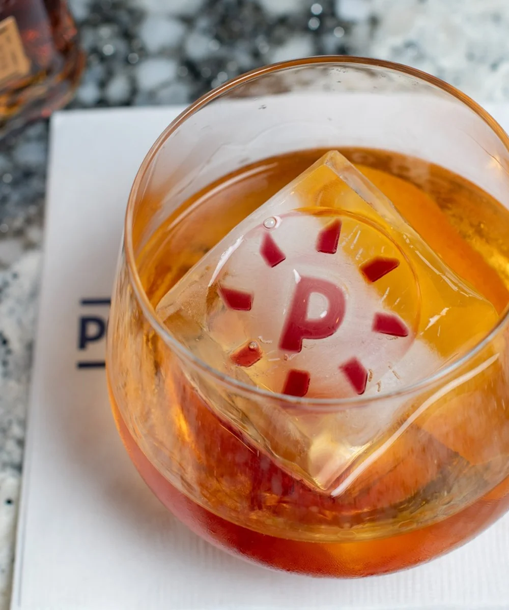 cocktail with Paddlefish-branded ice cube - mobile version